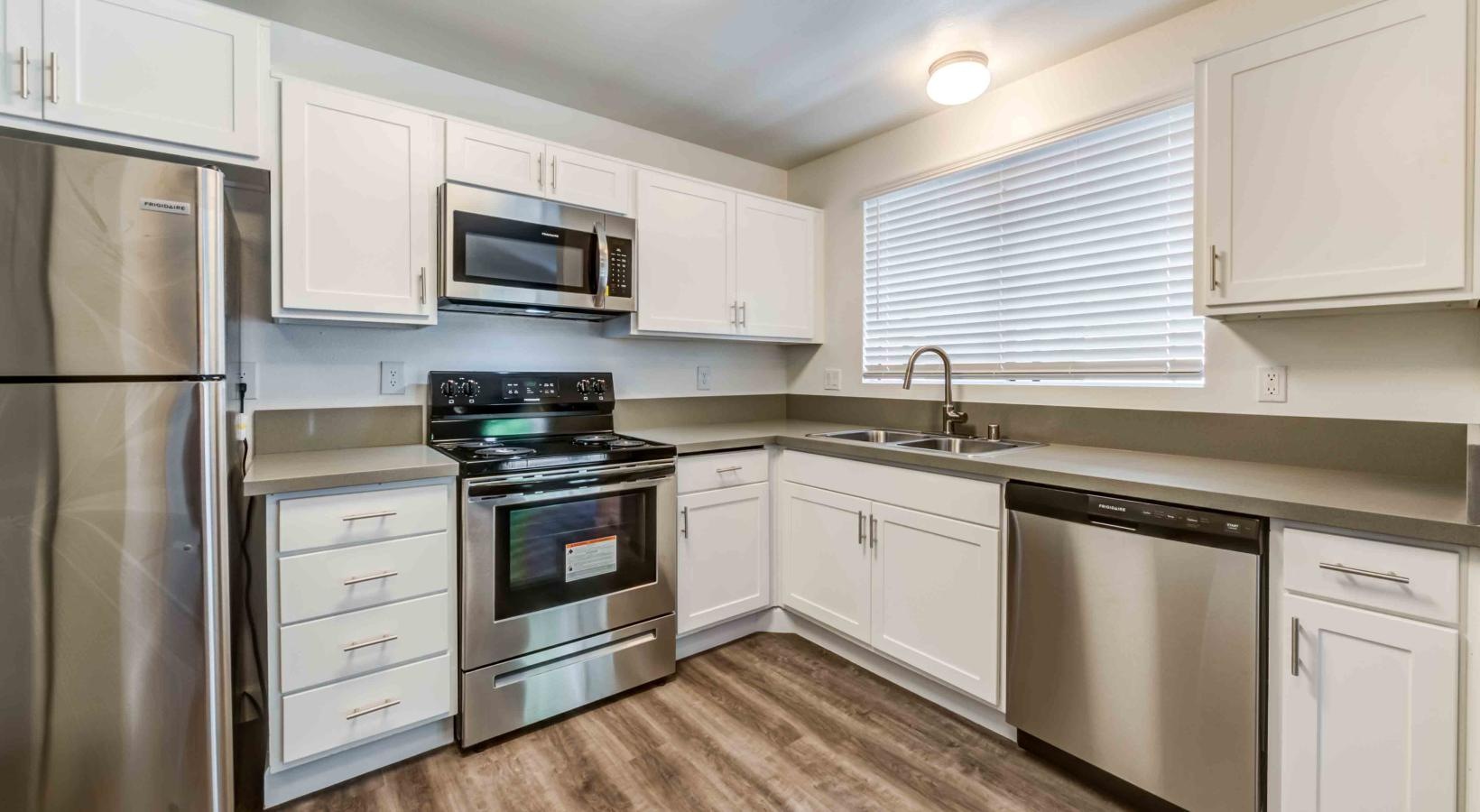 Beautiful kitchens with designer finishes a kitchen with white cabinets