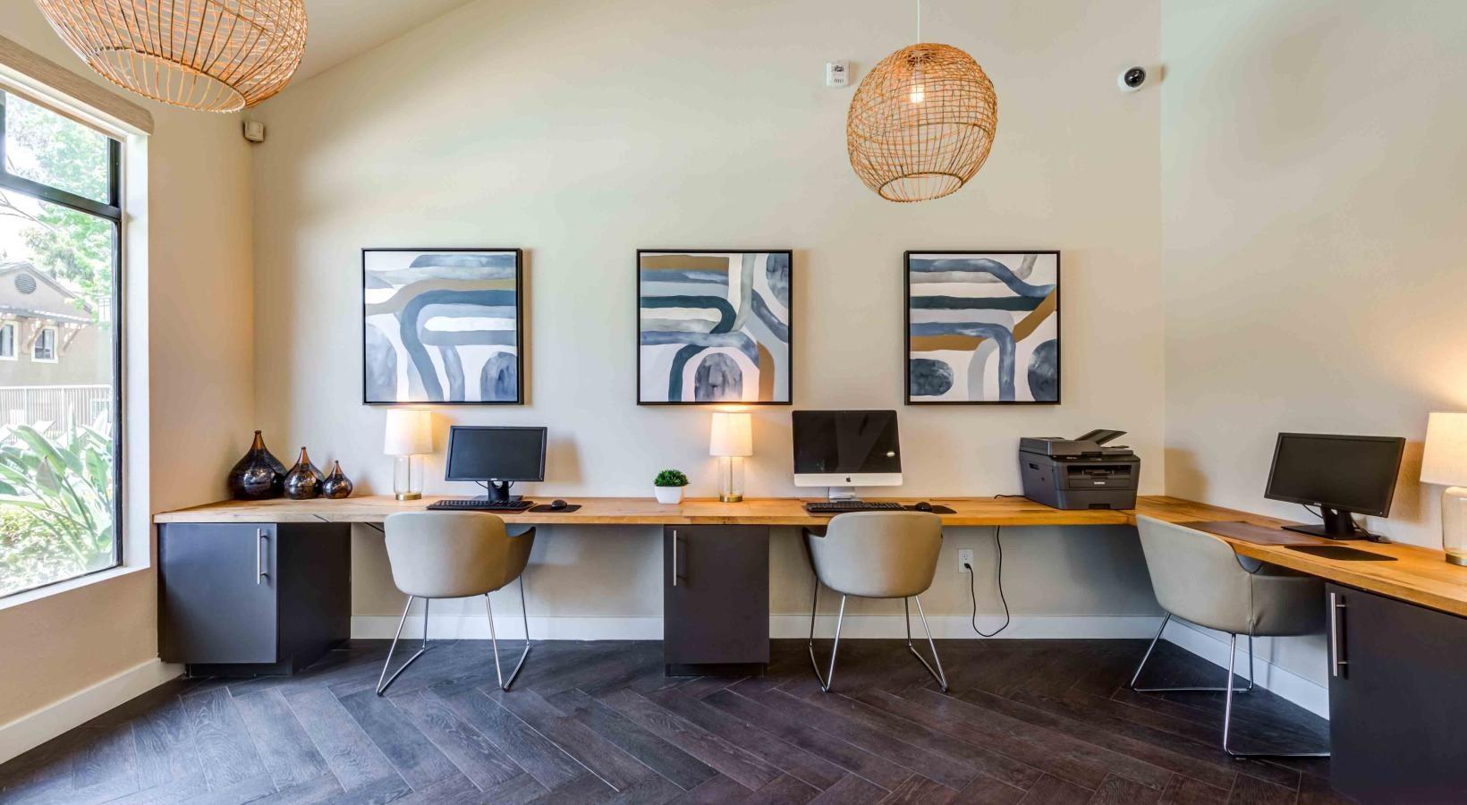 Everything within reach a room with a desk and chairs