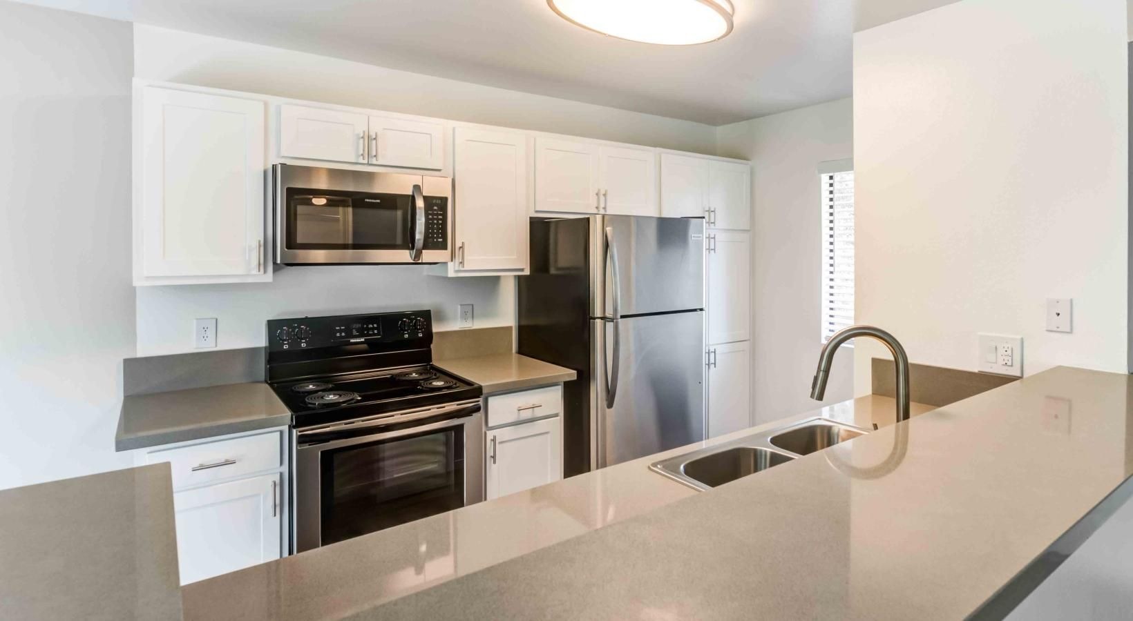 Beautiful kitchens with designer finishes a kitchen with white cabinets