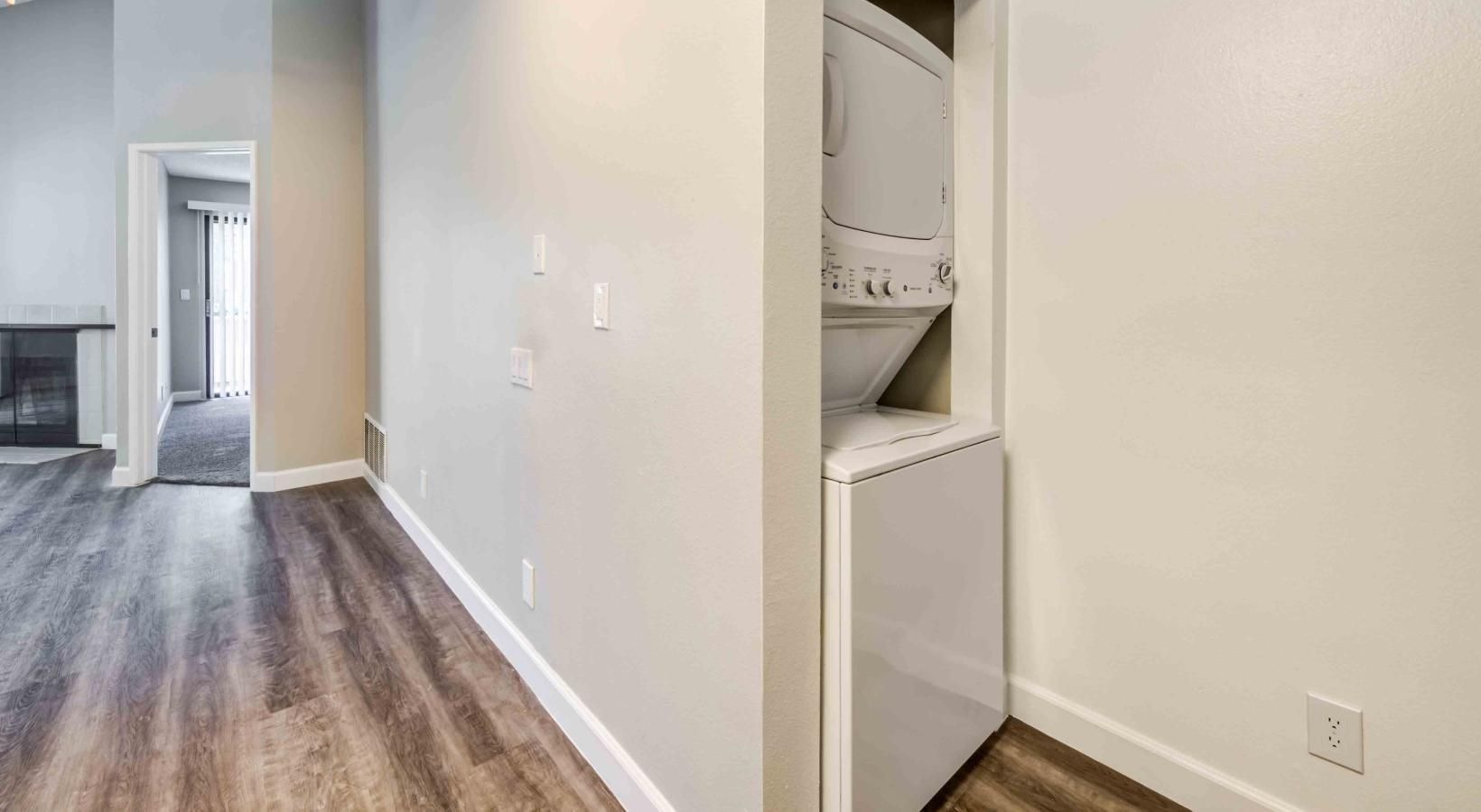 Washers and dryers available a well lit laundry area